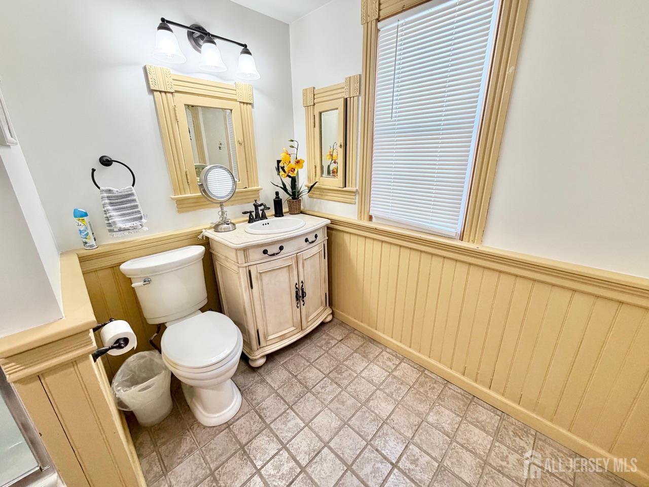 623-623 Main Street Leesburg, NJ 08327 - Photo 48 of 66 a white toilet sitting next to a bathroom sink