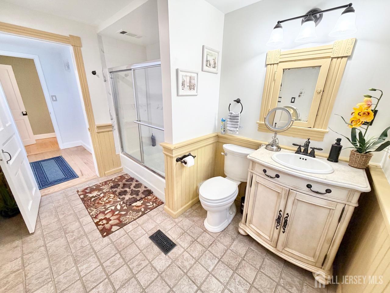 623-623 Main Street Leesburg, NJ 08327 - Photo 50 of 66 a bathroom with a sink toilet and shower