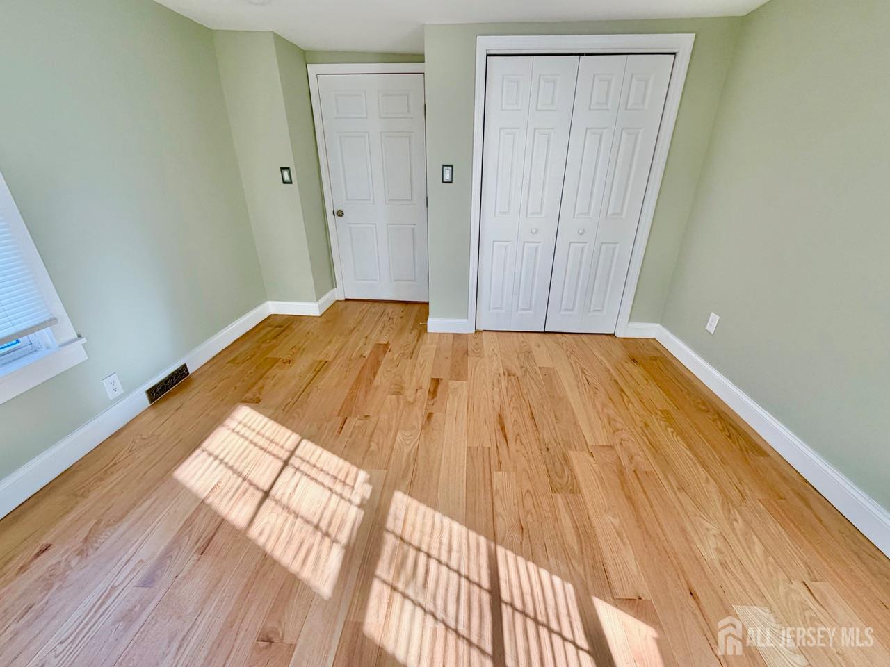 623-623 Main Street Leesburg, NJ 08327 - Photo 54 of 66 a view of a room with wooden floor and staircase