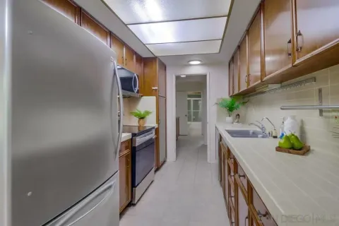 a kitchen with kitchen island granite countertop lots of counter top space