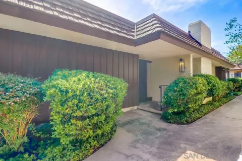 a view of swimming pool with a yard