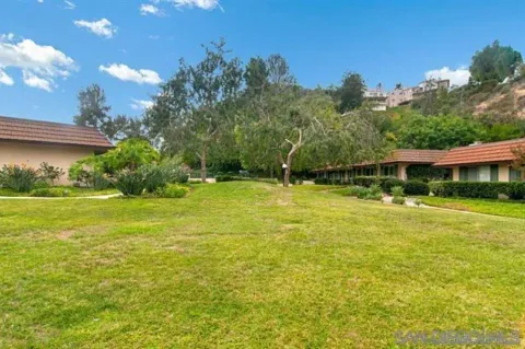an aerial view of a city with lots of residential buildings