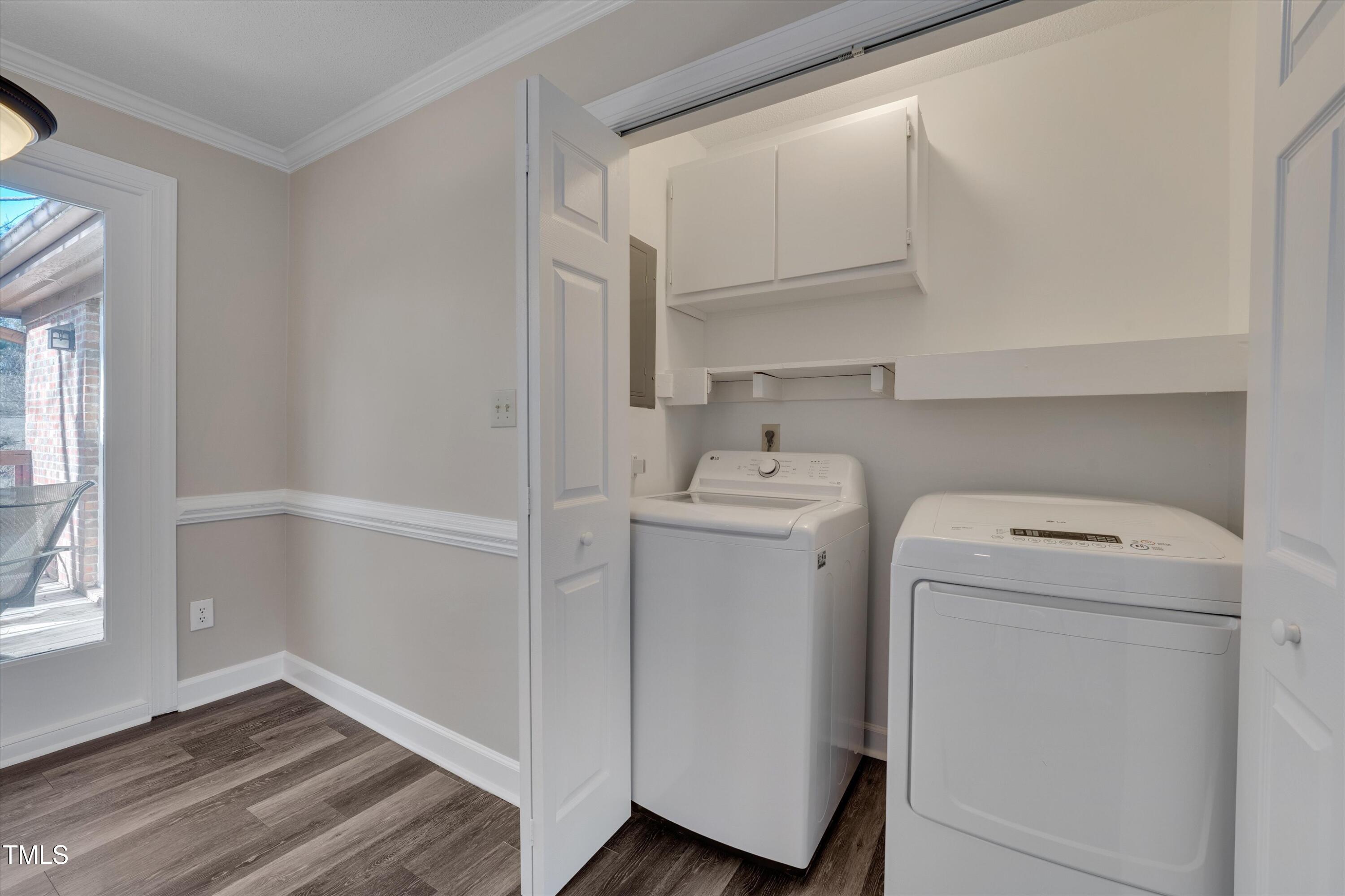 5500 Fortunes Ridge Drive, Unit 67B Durham, NC 27713 - Photo 12 of 34 a view of storage and utility room with washer and dryer