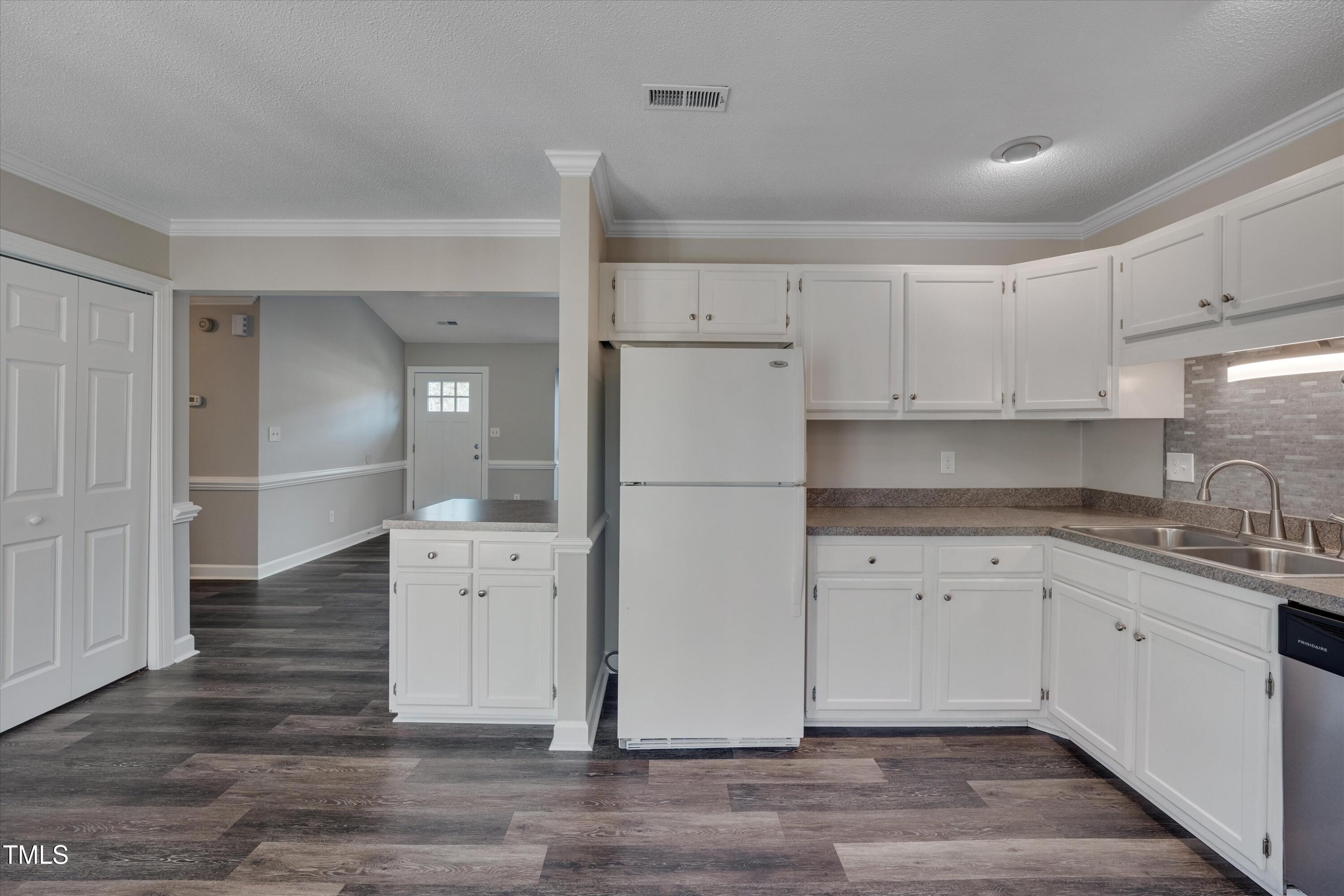 5500 Fortunes Ridge Drive, Unit 67B Durham, NC 27713 - Photo 14 of 34 a kitchen with a refrigerator a sink and dishwasher