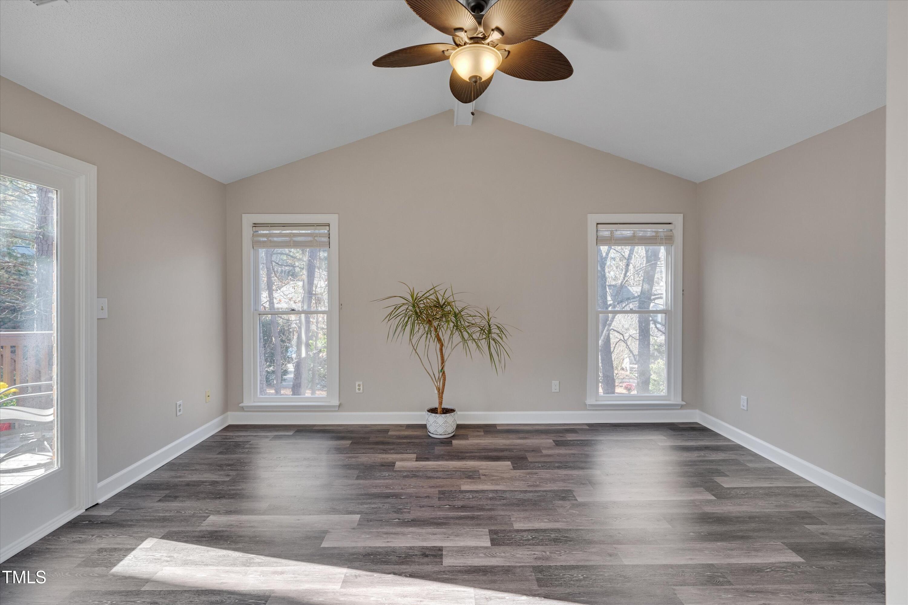 5500 Fortunes Ridge Drive, Unit 67B Durham, NC 27713 - Photo 18 of 34 a view of empty room with wooden floor and fan