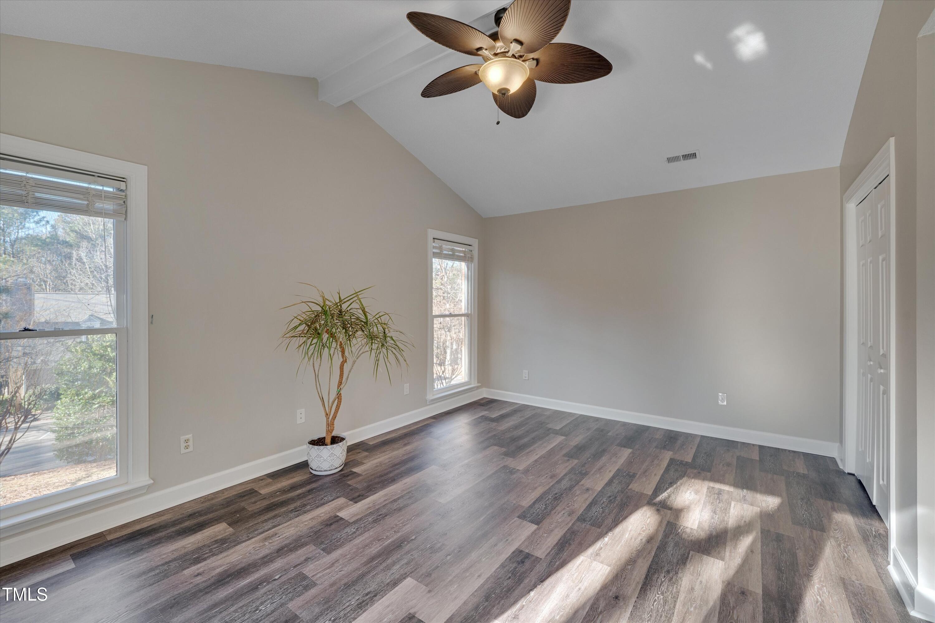 5500 Fortunes Ridge Drive, Unit 67B Durham, NC 27713 - Photo 19 of 34 a view of empty room with wooden floor and fan