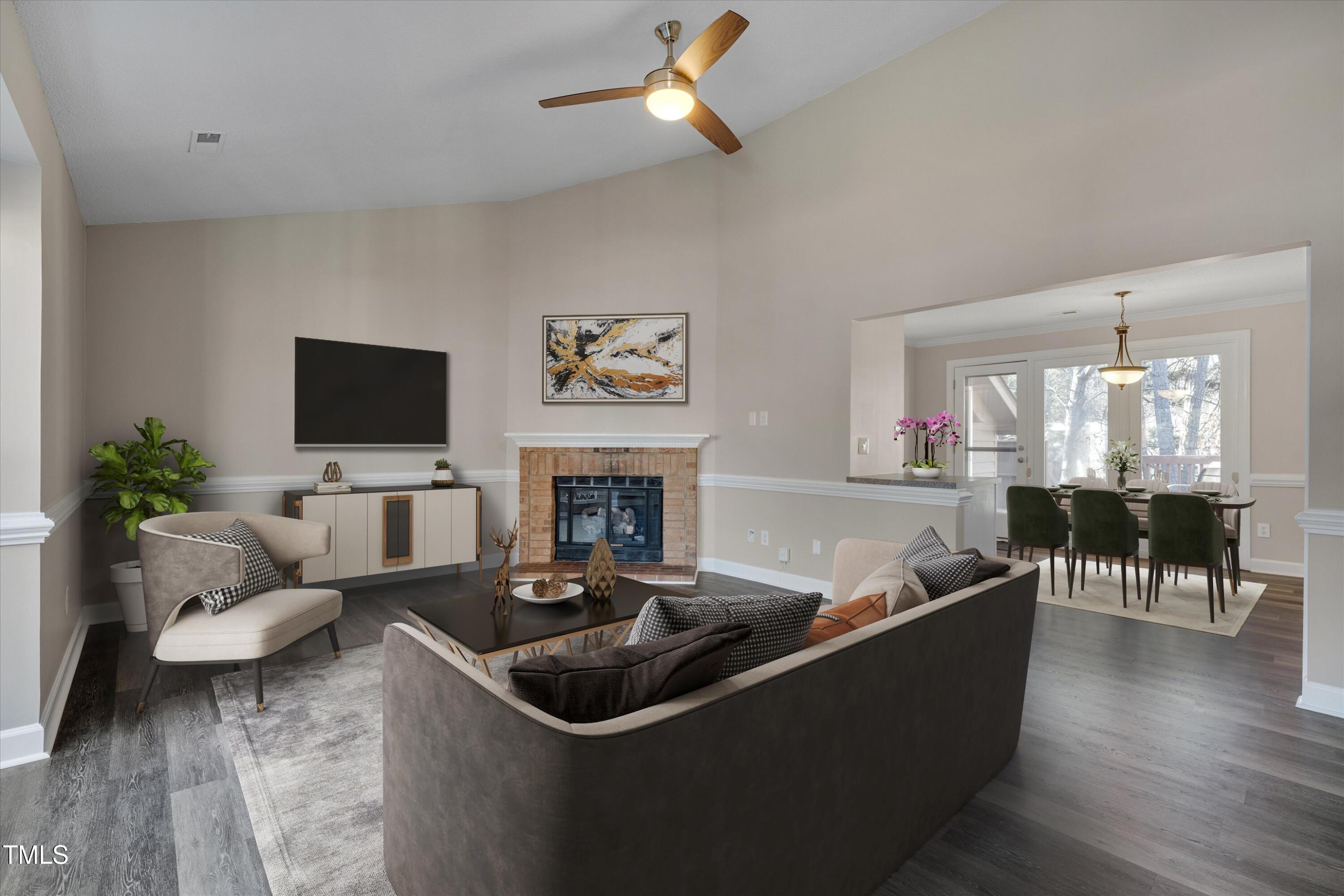 5500 Fortunes Ridge Drive, Unit 67B Durham, NC 27713 - Photo 4 of 34 a living room with furniture and a fireplace
