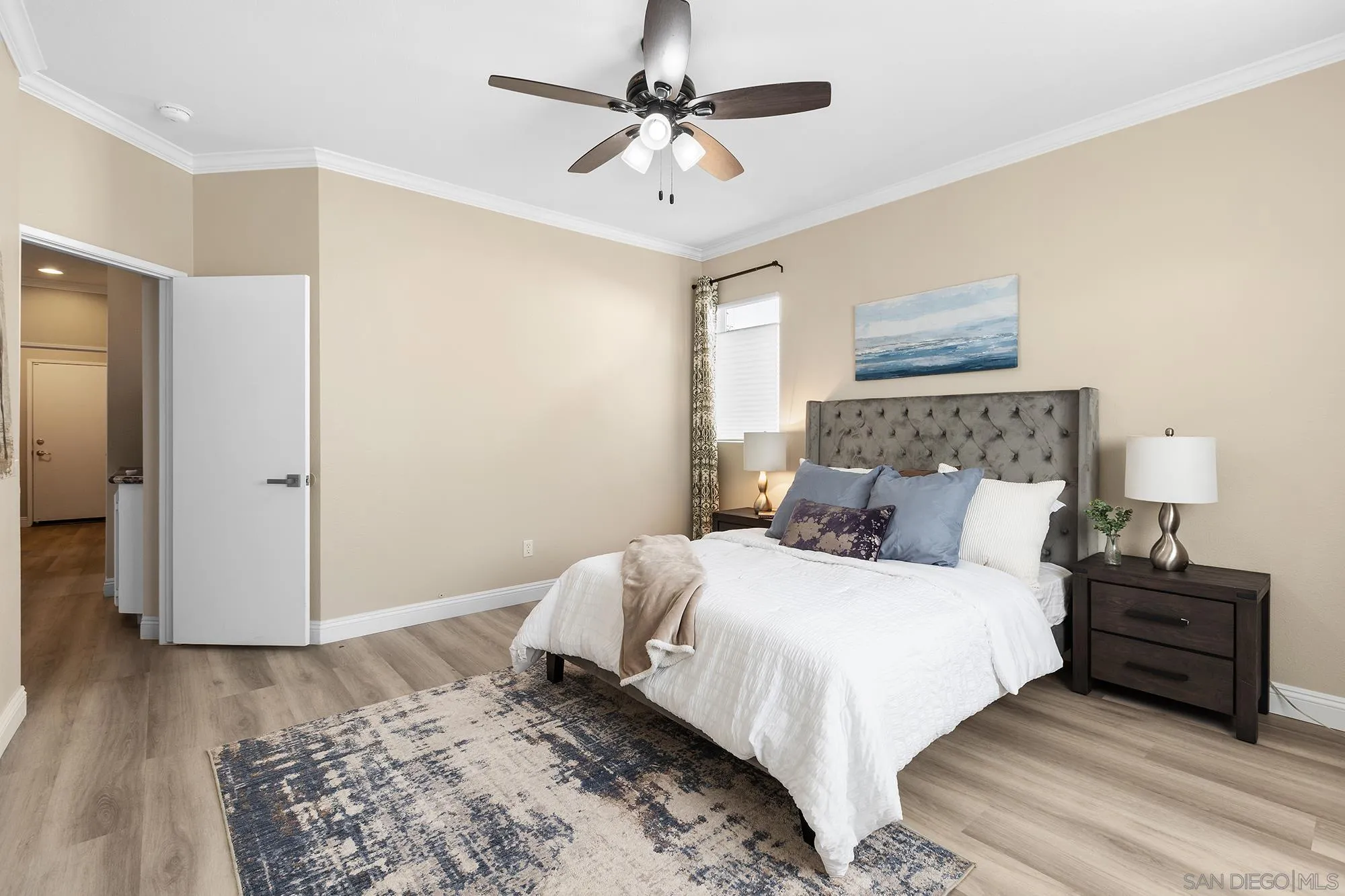 33451 Victoria Court Temecula, CA 92592 - Photo 19 of 38 a bedroom with a bed and a ceiling fan