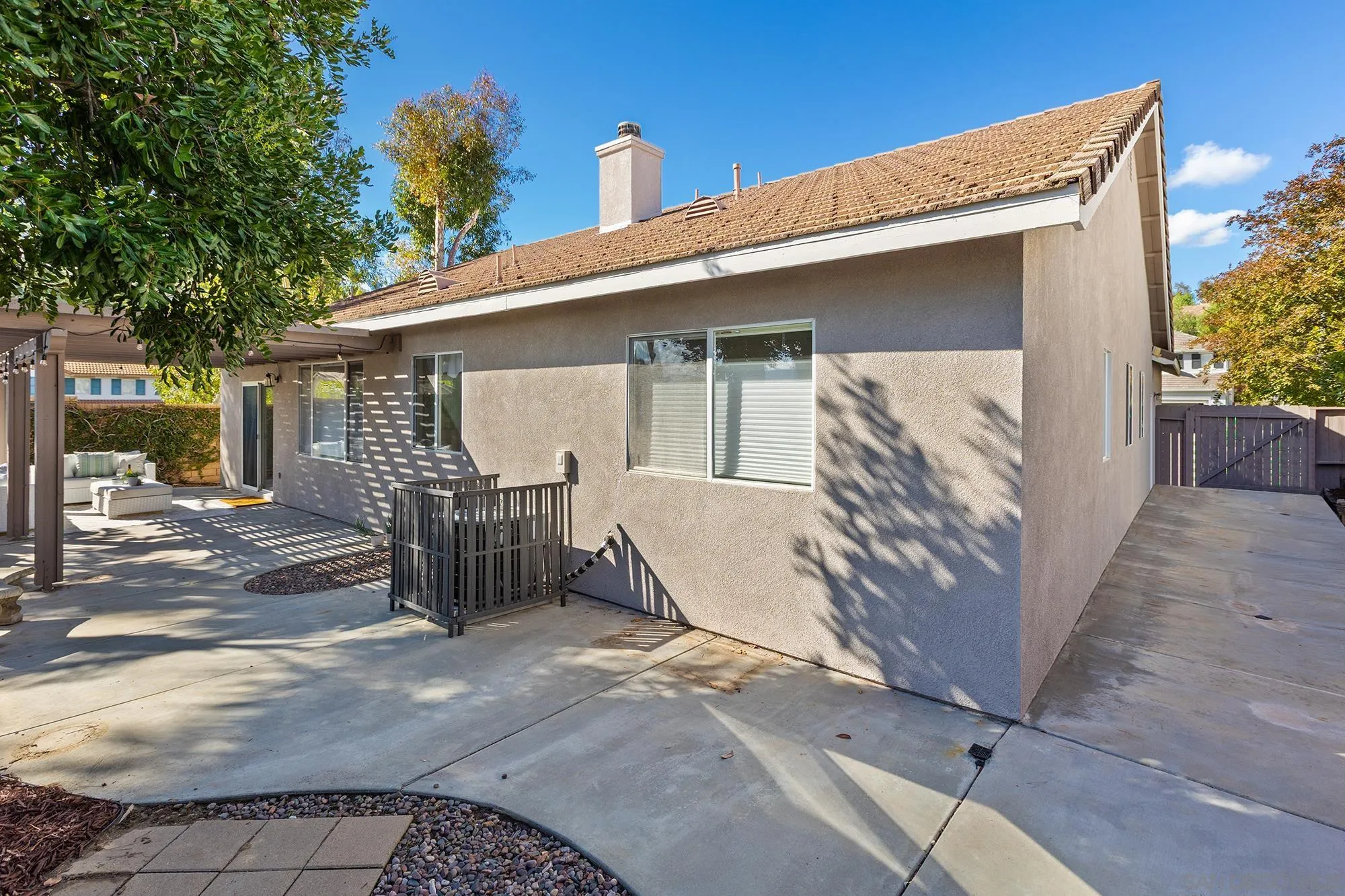 33451 Victoria Court Temecula, CA 92592 - Photo 32 of 38 a view of a house with a patio