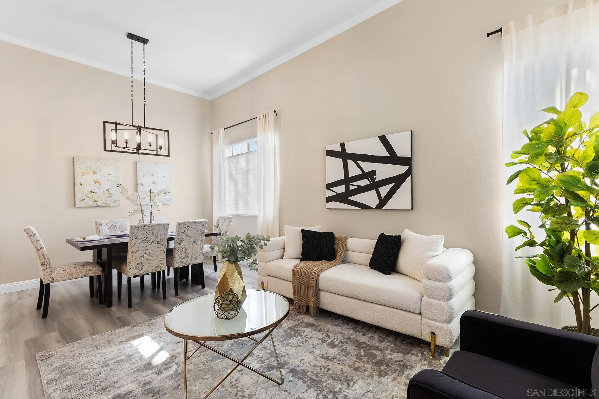 33451 Victoria Court Temecula, CA 92592 - Photo 7 of 38 a living room with furniture and a potted plant