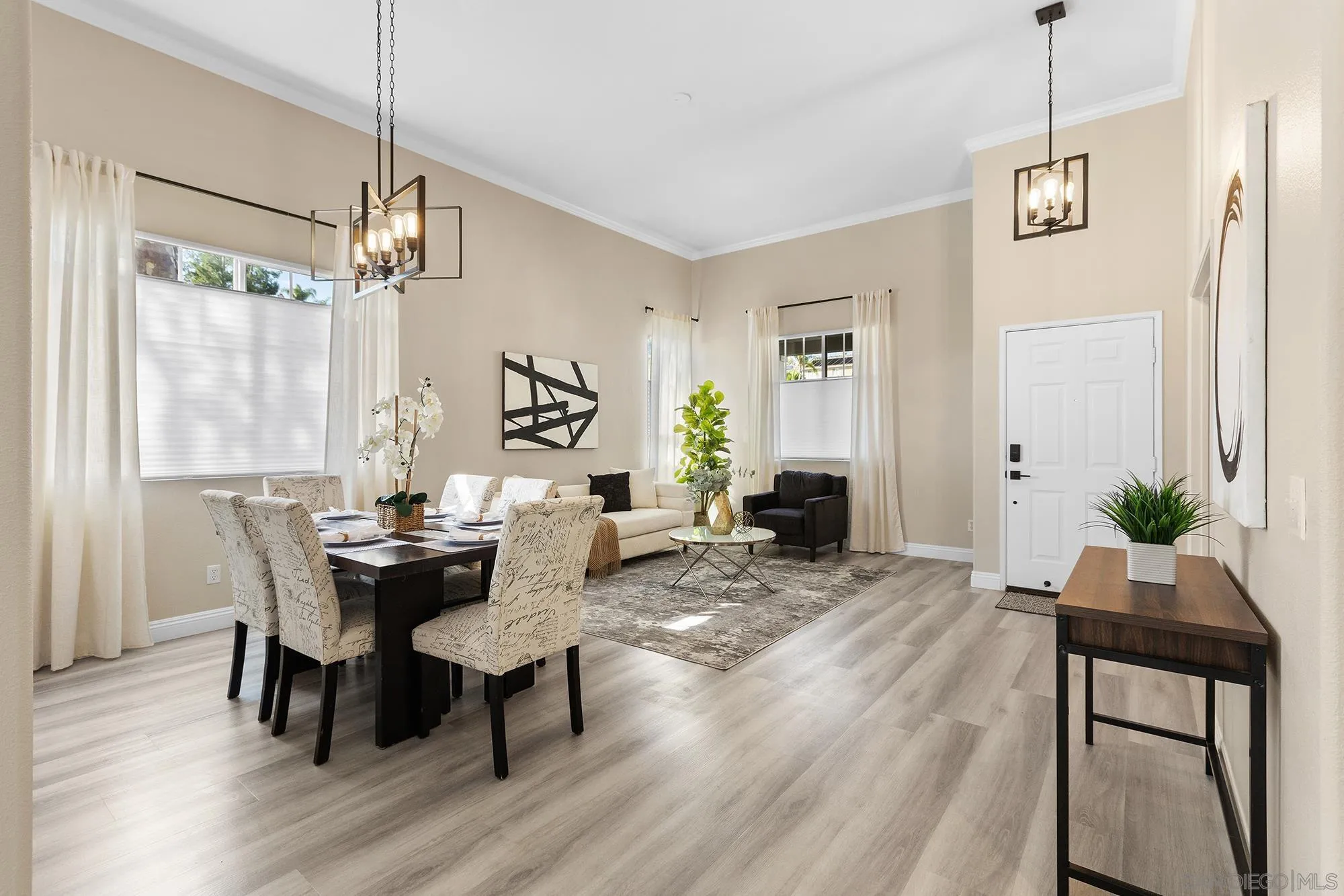 33451 Victoria Court Temecula, CA 92592 - Photo 10 of 38 a view of a dining room with furniture window and wooden floor