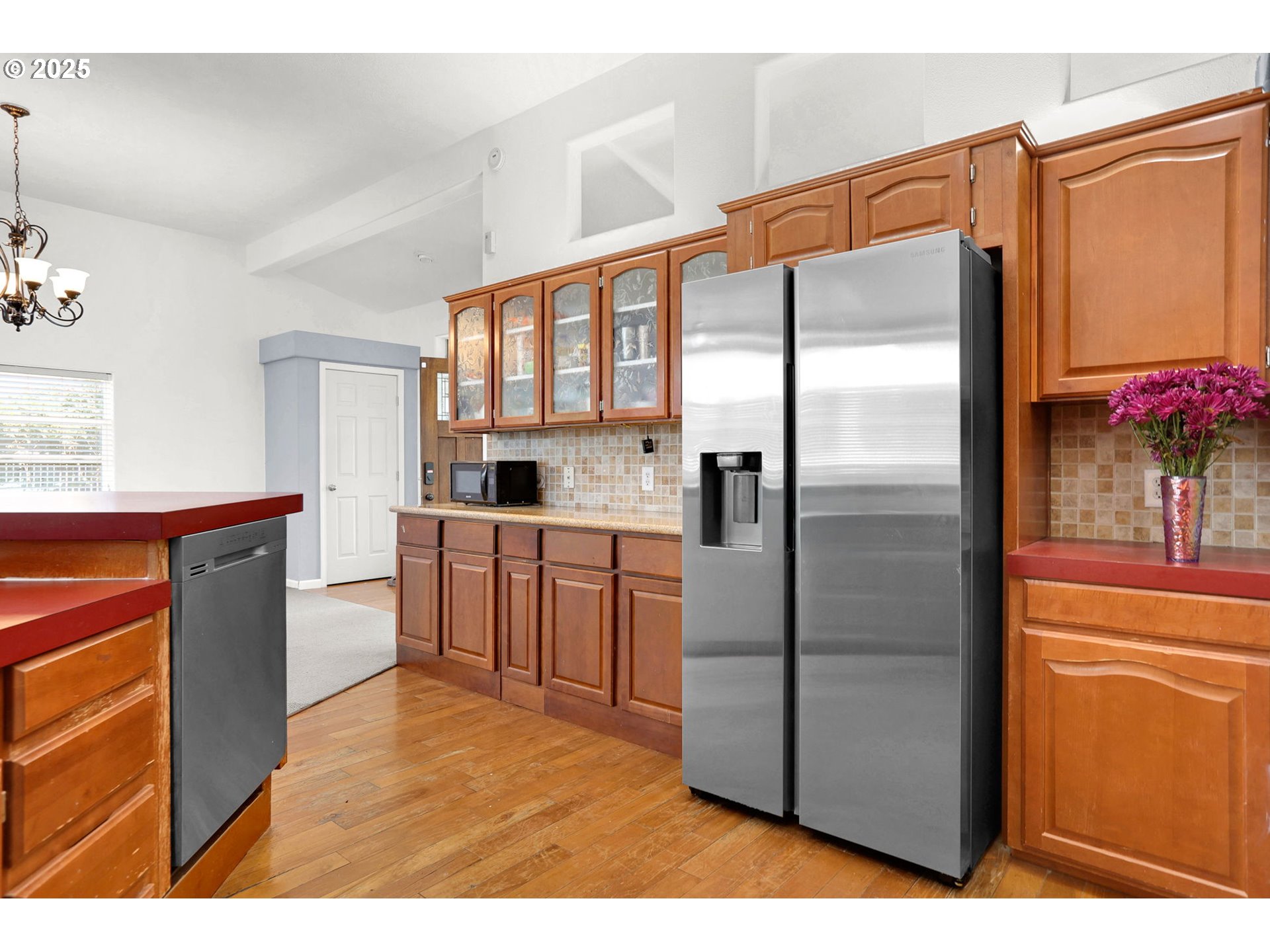 5365 Cobblestone Lane Eugene, OR 97402 - Photo 14 of 40 a kitchen with stainless steel appliances a refrigerator and a sink