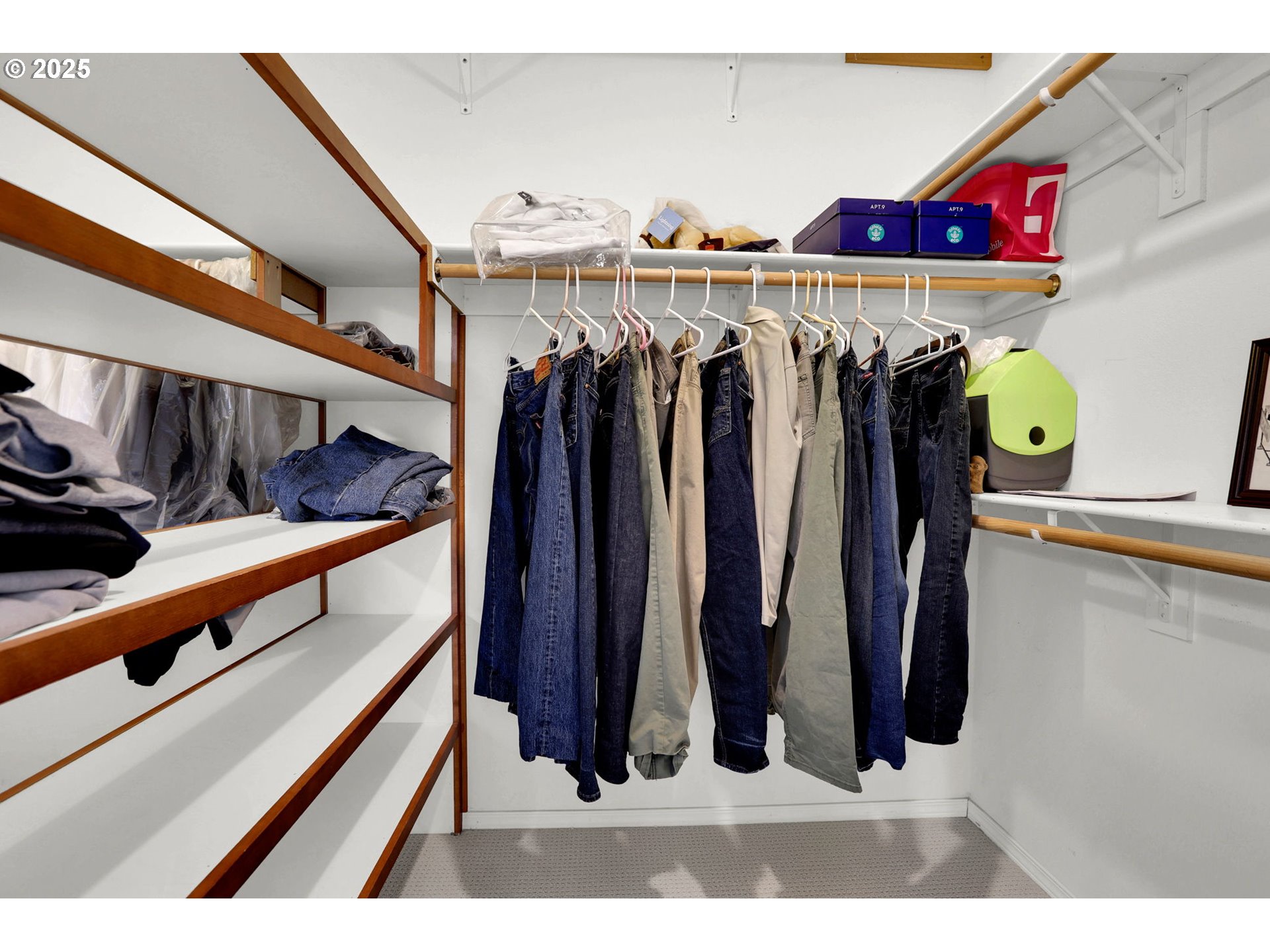 5365 Cobblestone Lane Eugene, OR 97402 - Photo 24 of 40 a view of walk in closet with clothes and shoes