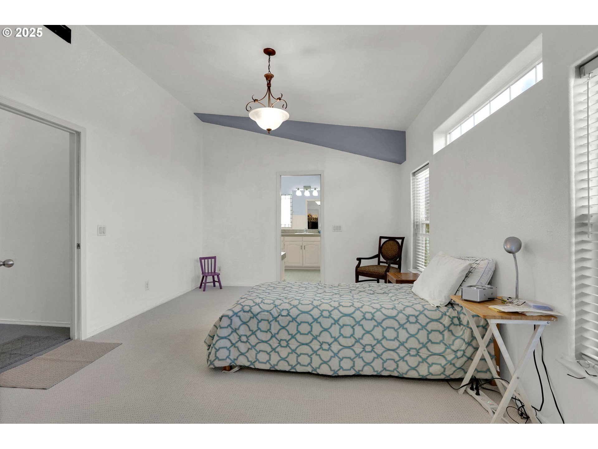 5365 Cobblestone Lane Eugene, OR 97402 - Photo 26 of 40 a bedroom with a bed and window