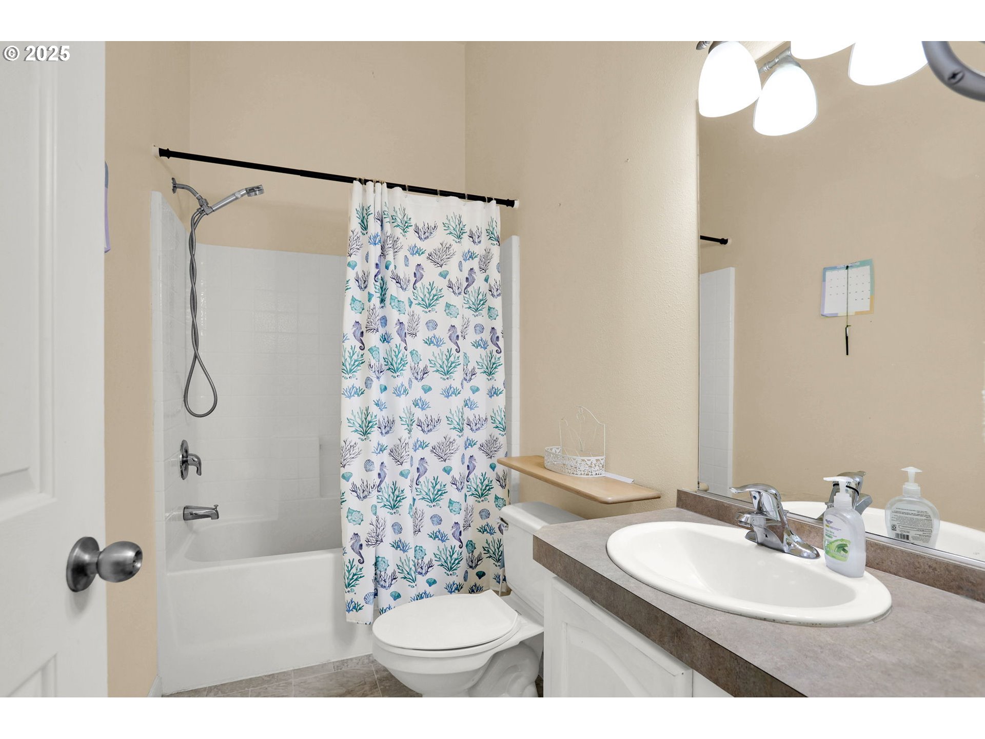 5365 Cobblestone Lane Eugene, OR 97402 - Photo 31 of 40 a bathroom with a sink a toilet and shower