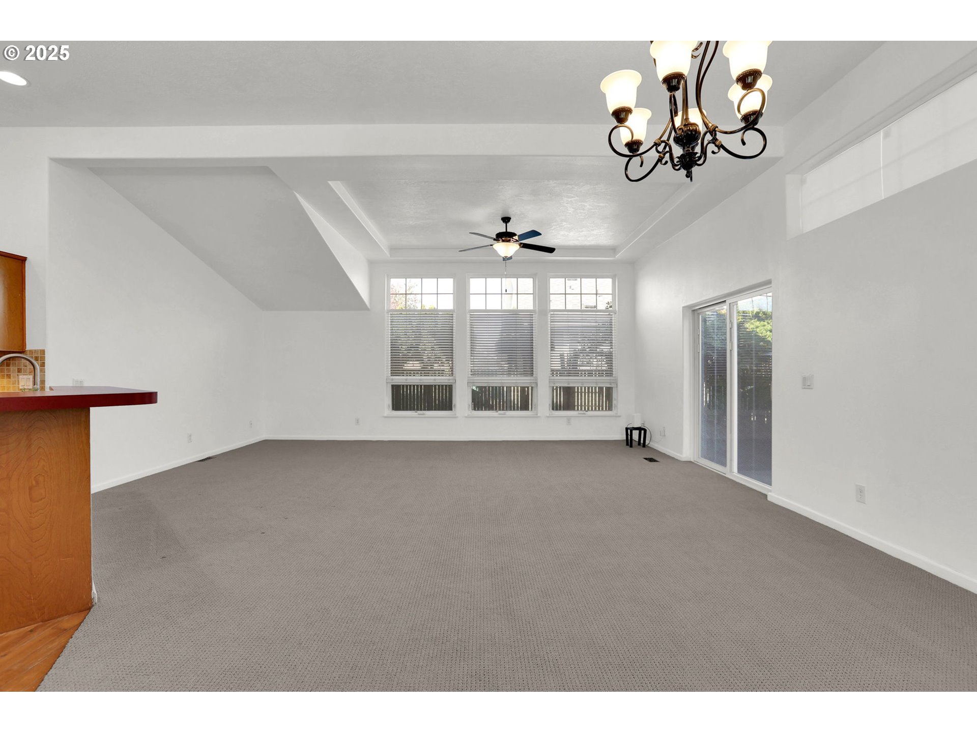 5365 Cobblestone Lane Eugene, OR 97402 - Photo 6 of 40 a view of an empty room with a chandelier fan