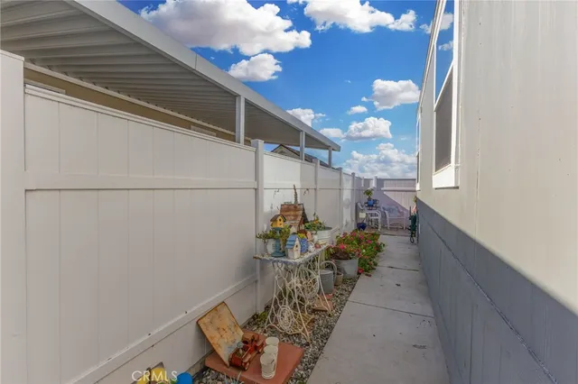 a view of a house with a street