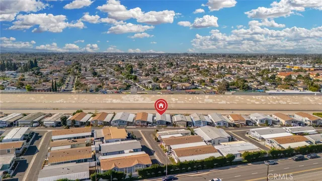 a swimming pool with outdoor seating