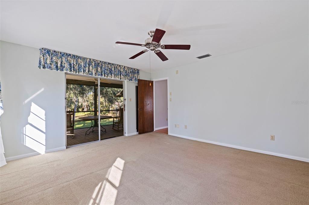 8609 Stoner Road Riverview, FL 33569 - Photo 25 of 66 a view of an empty room with a window