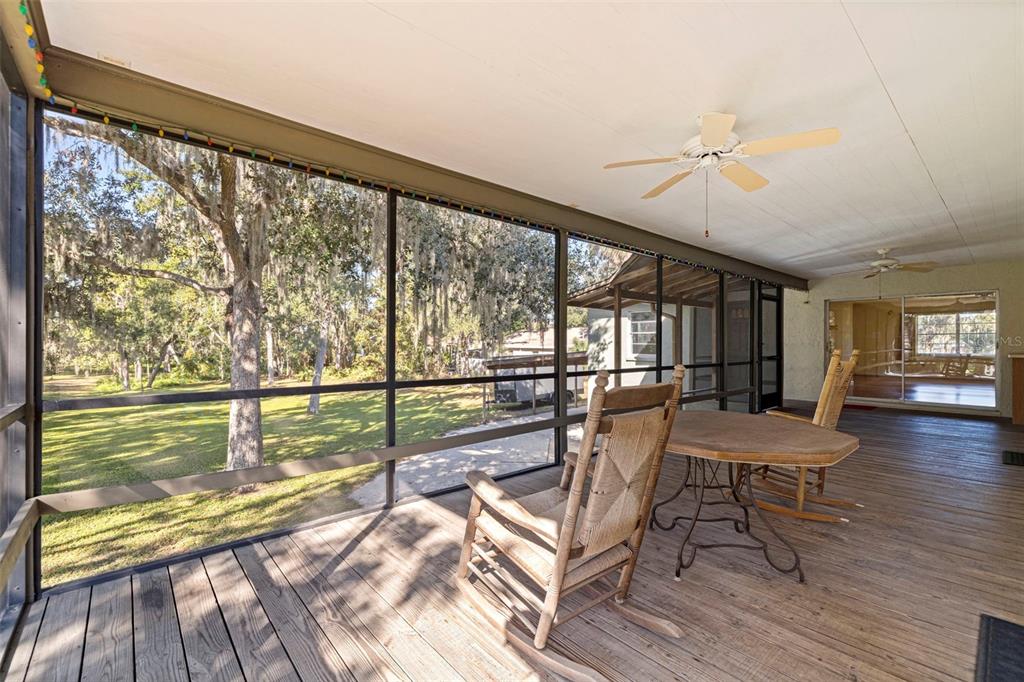 8609 Stoner Road Riverview, FL 33569 - Photo 30 of 66 a view of a room with furniture and wooden floor