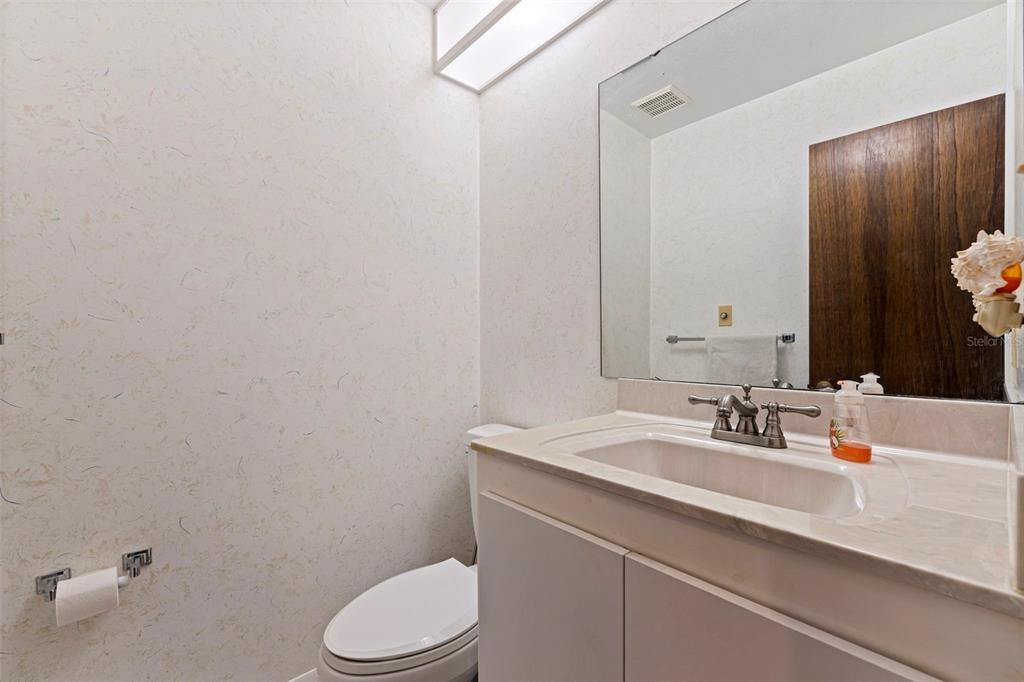 8609 Stoner Road Riverview, FL 33569 - Photo 33 of 66 a bathroom with a sink a toilet and mirror