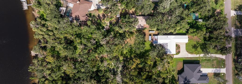 8609 Stoner Road Riverview, FL 33569 - Photo 57 of 66 an aerial view of a house with a yard and garden