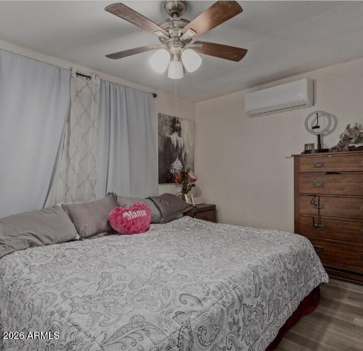 5002 West Bethany Home Road, Unit 104 Glendale, AZ 85301 - Photo 13 of 17 a bedroom with a bed and closet
