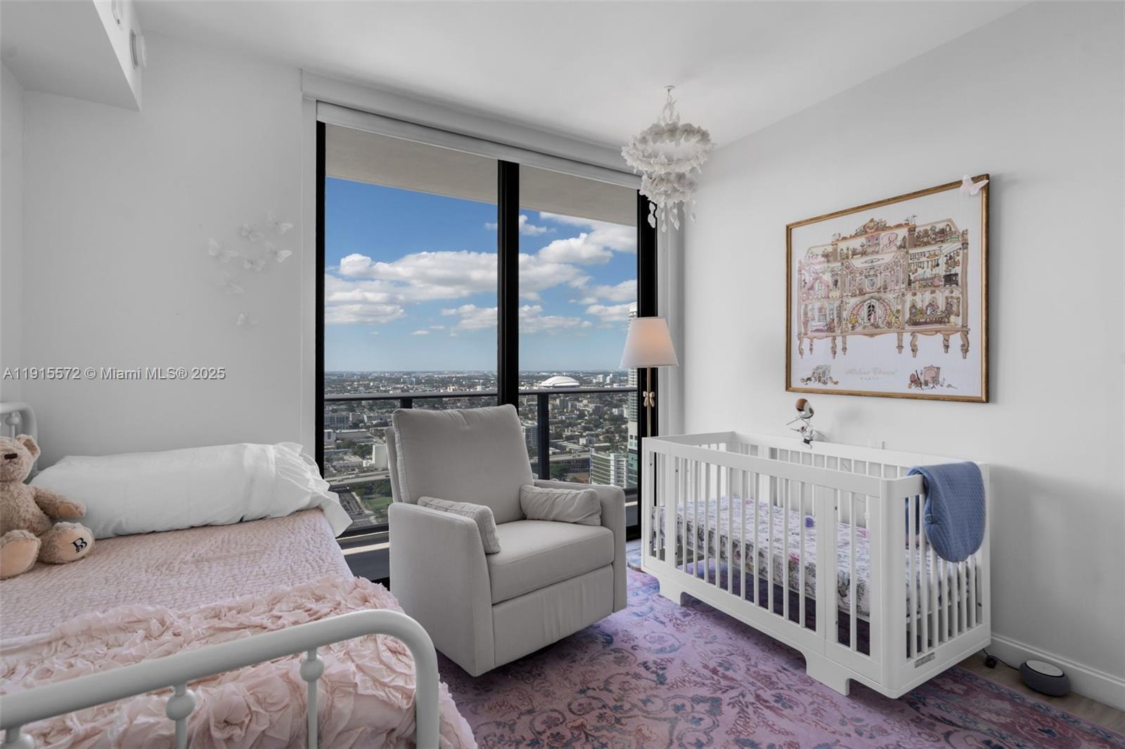 55 Southwest 9th Street, Unit 4008 Miami, FL 33130 - Photo 16 of 36 a bedroom with furniture and a large window