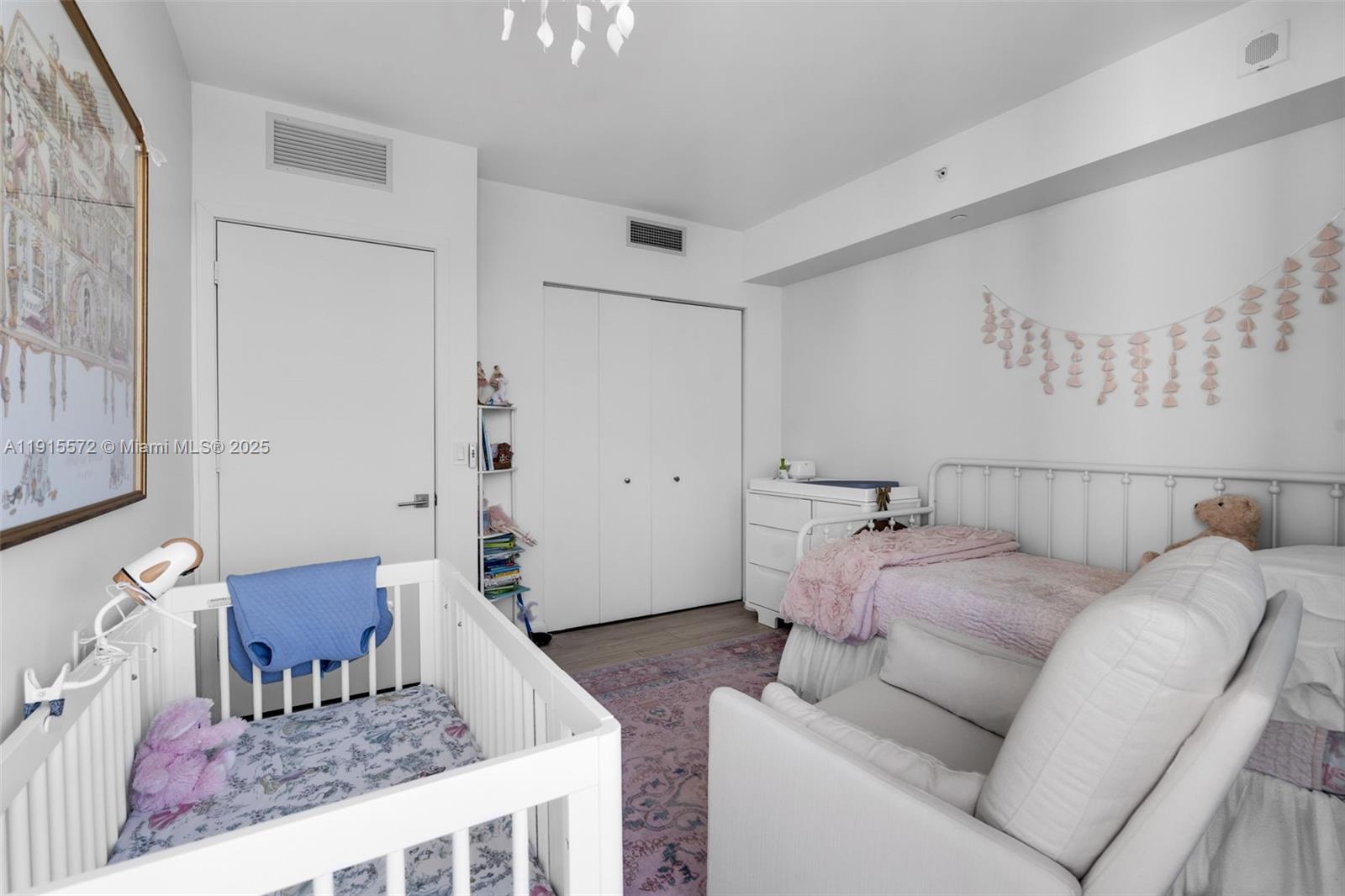 55 Southwest 9th Street, Unit 4008 Miami, FL 33130 - Photo 17 of 36 a living room with furniture and wooden floor