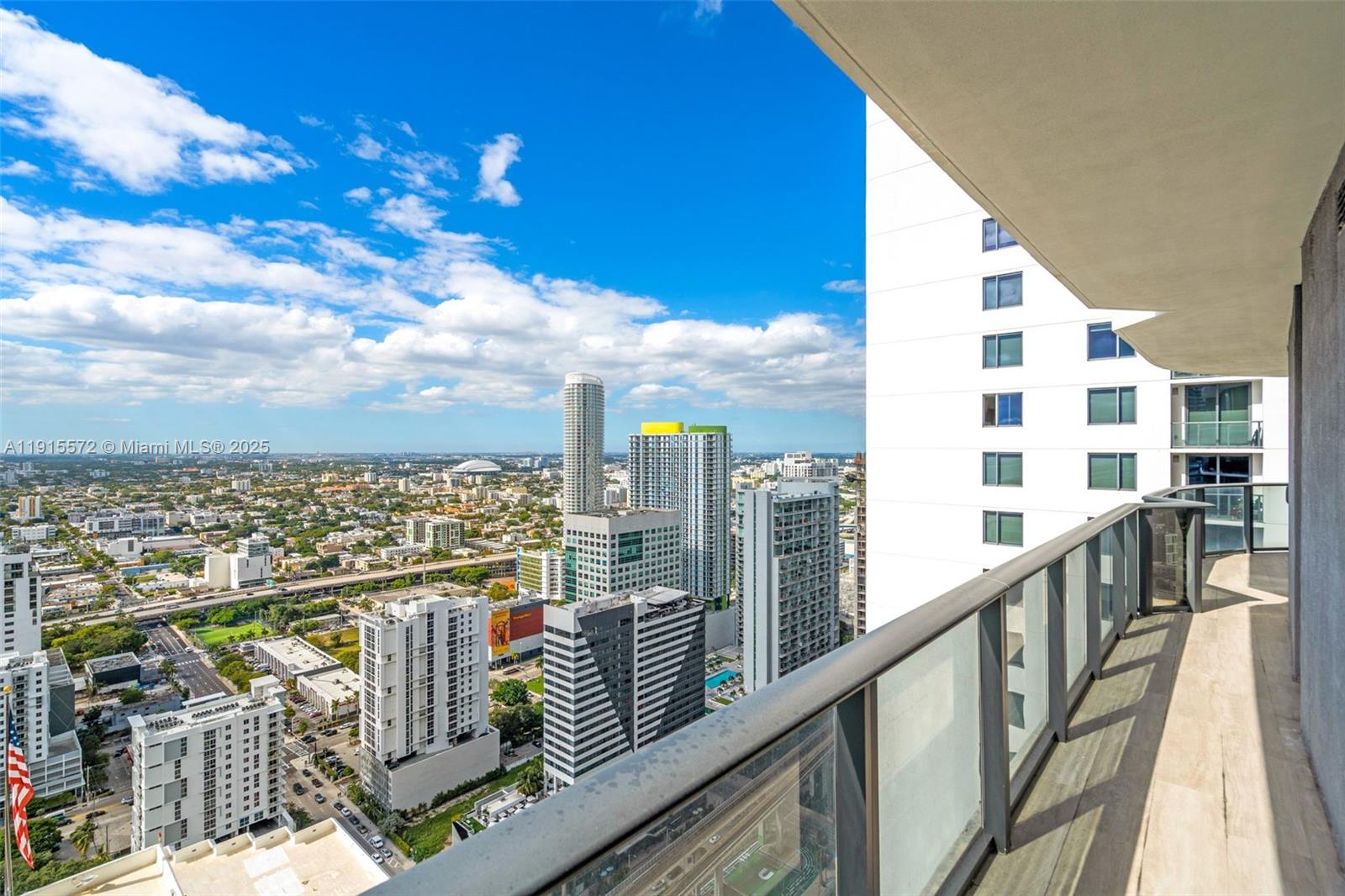 55 Southwest 9th Street, Unit 4008 Miami, FL 33130 - Photo 20 of 36 a view of a balcony with city view