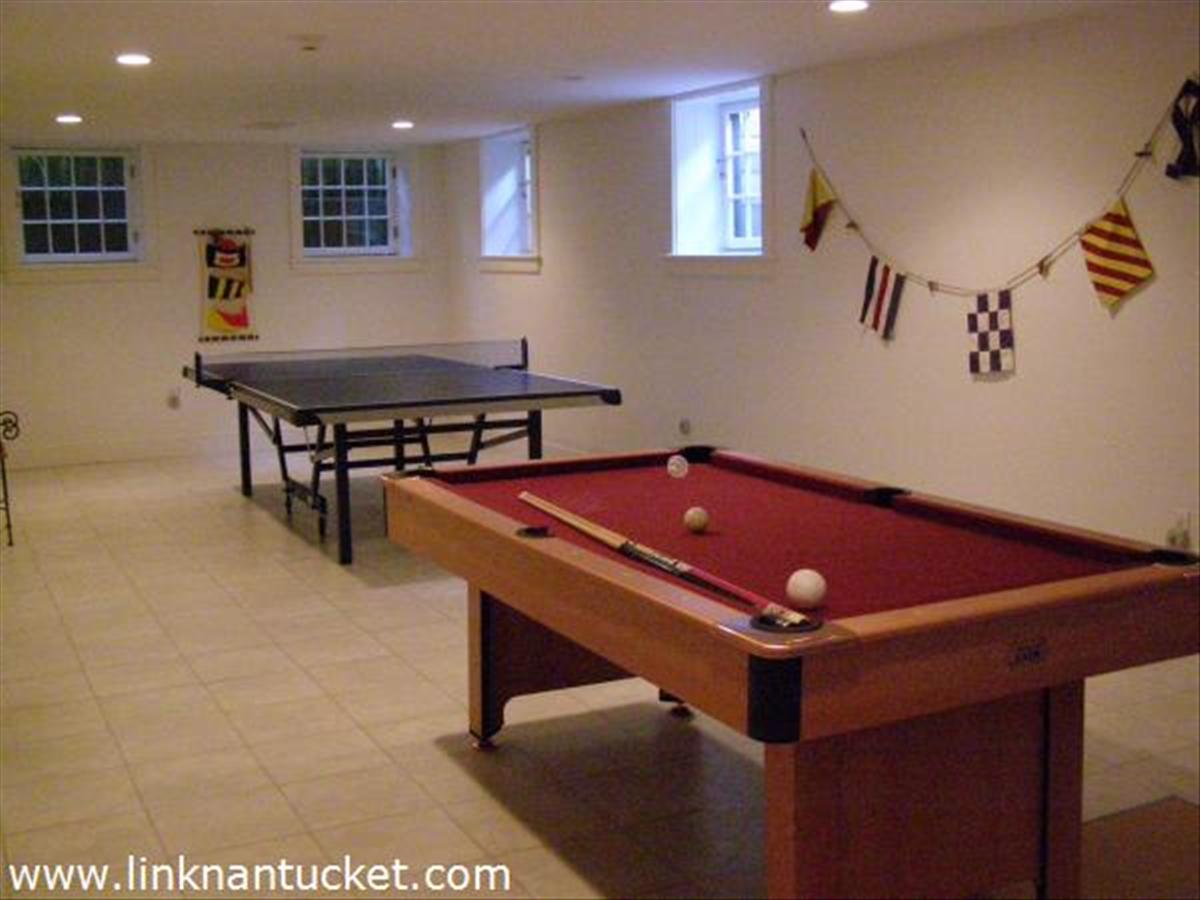 21 R Madaket Road Nantucket, MA 02554 - Photo 18 of 20 Finished basement- complete with custom cherry stairs to & from bulkhead
