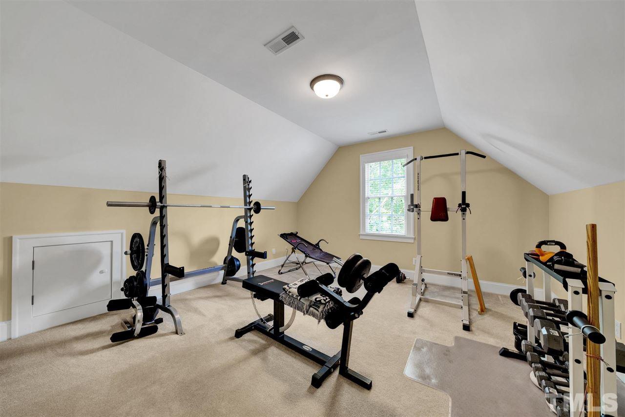 403 Yarmouth Road Raleigh, NC 27608 - Photo 19 of 30 a view of a room with gym equipment