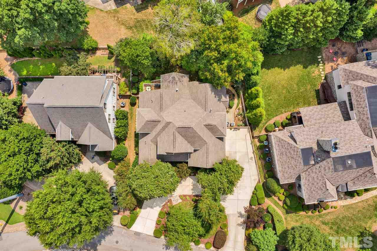 403 Yarmouth Road Raleigh, NC 27608 - Photo 30 of 30 an aerial view of residential house with outdoor space and trees all around