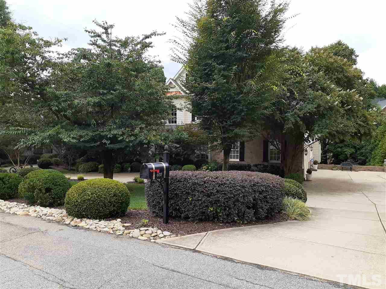 403 Yarmouth Road Raleigh, NC 27608 - Photo 5 of 30 a view of a house with a street