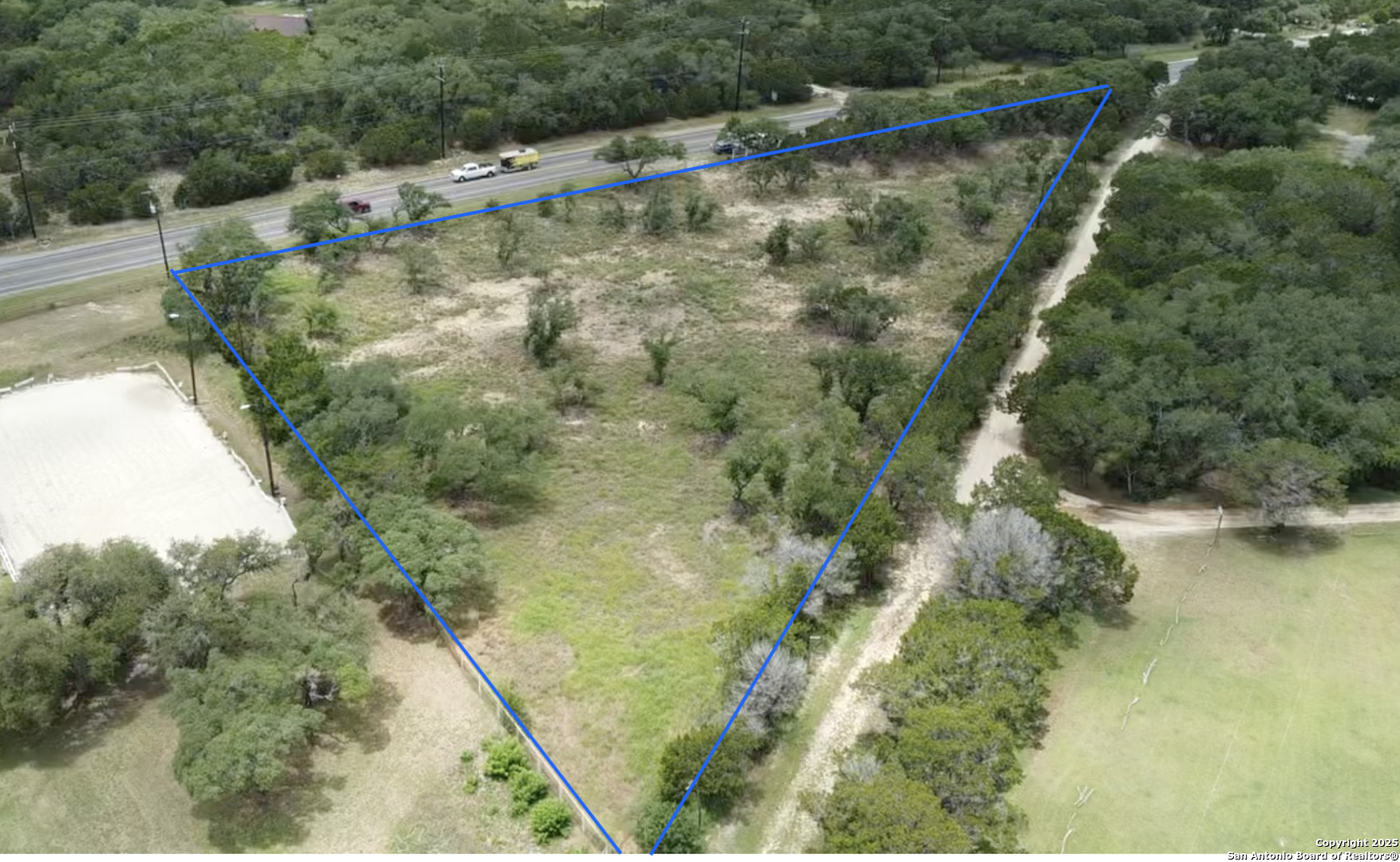 5865 Fm 1863 Bulverde, TX 78163 - Photo 5 of 7 a view of a forest with a lake