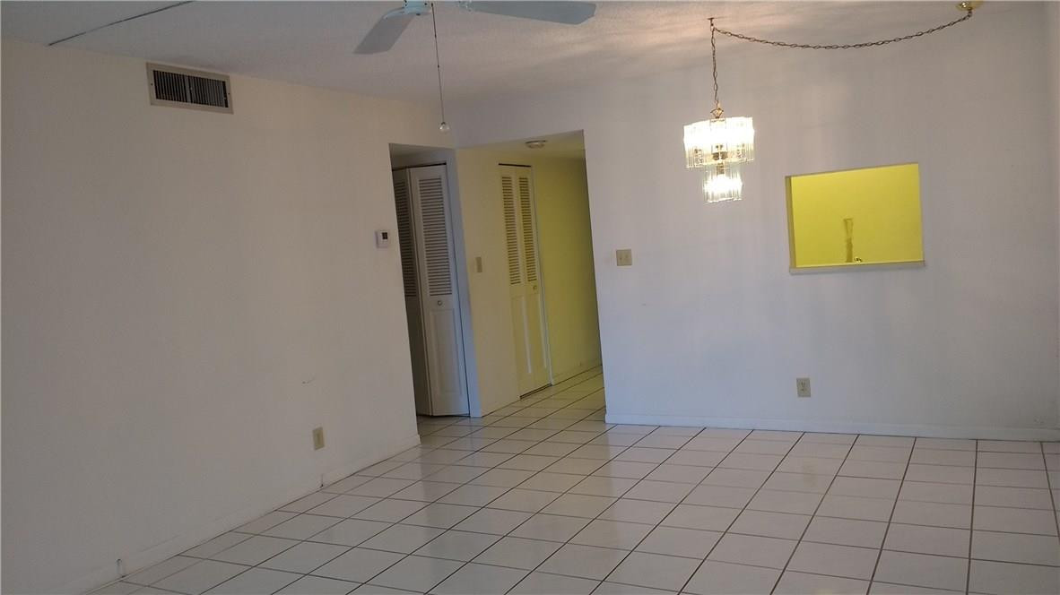 7950 West McNab Road, Unit 304 Tamarac, FL 33321 - Photo 4 of 15 a view of a room with window