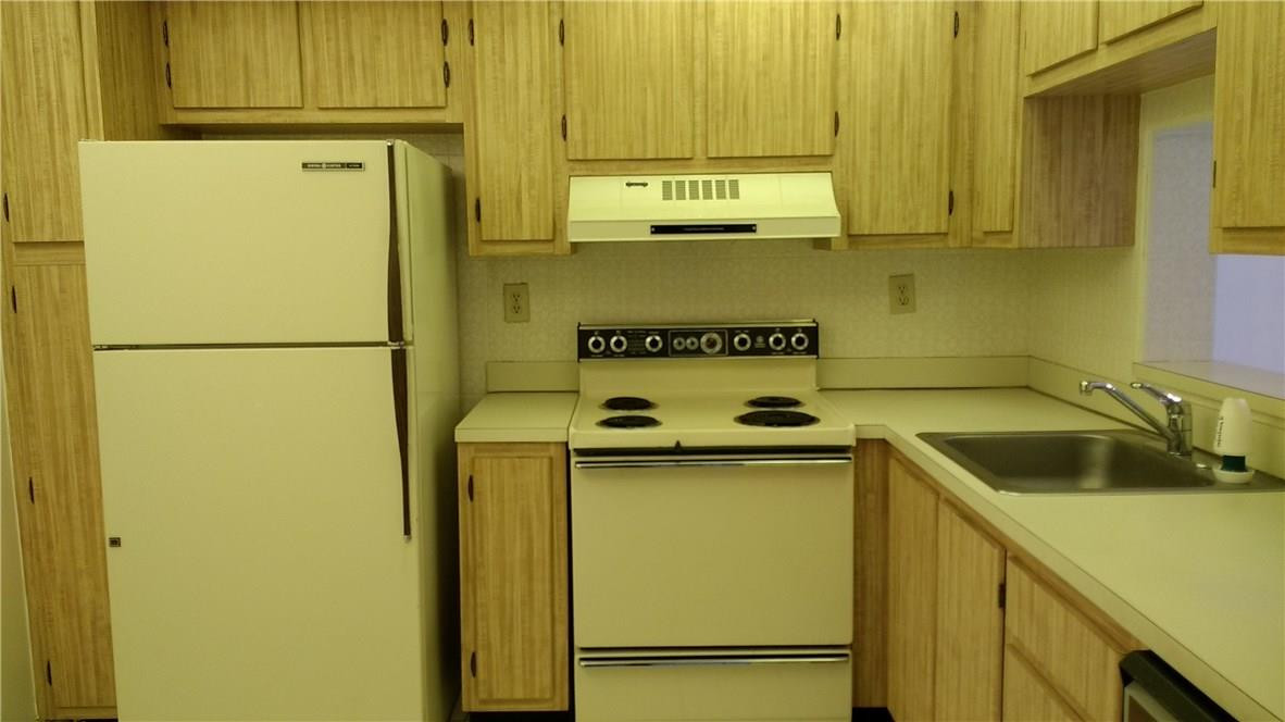 7950 West McNab Road, Unit 304 Tamarac, FL 33321 - Photo 8 of 15 a utility room with dryer and washer