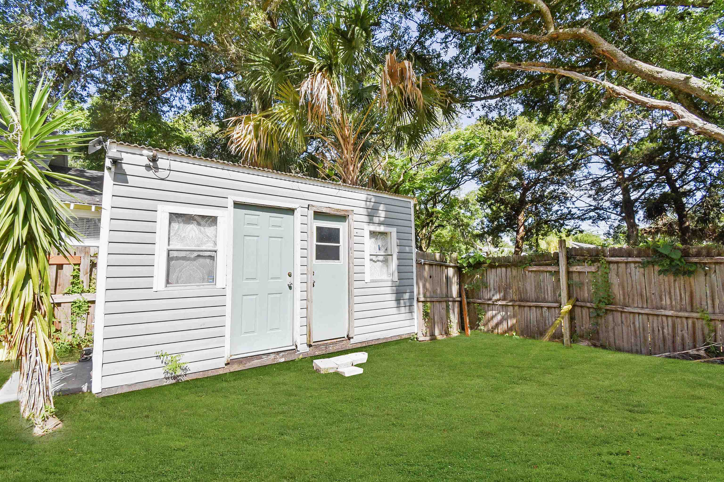 14 Rio Vista Avenue St. Augustine, FL 32084 - Photo 19 of 33 a view of a backyard with a small cabin