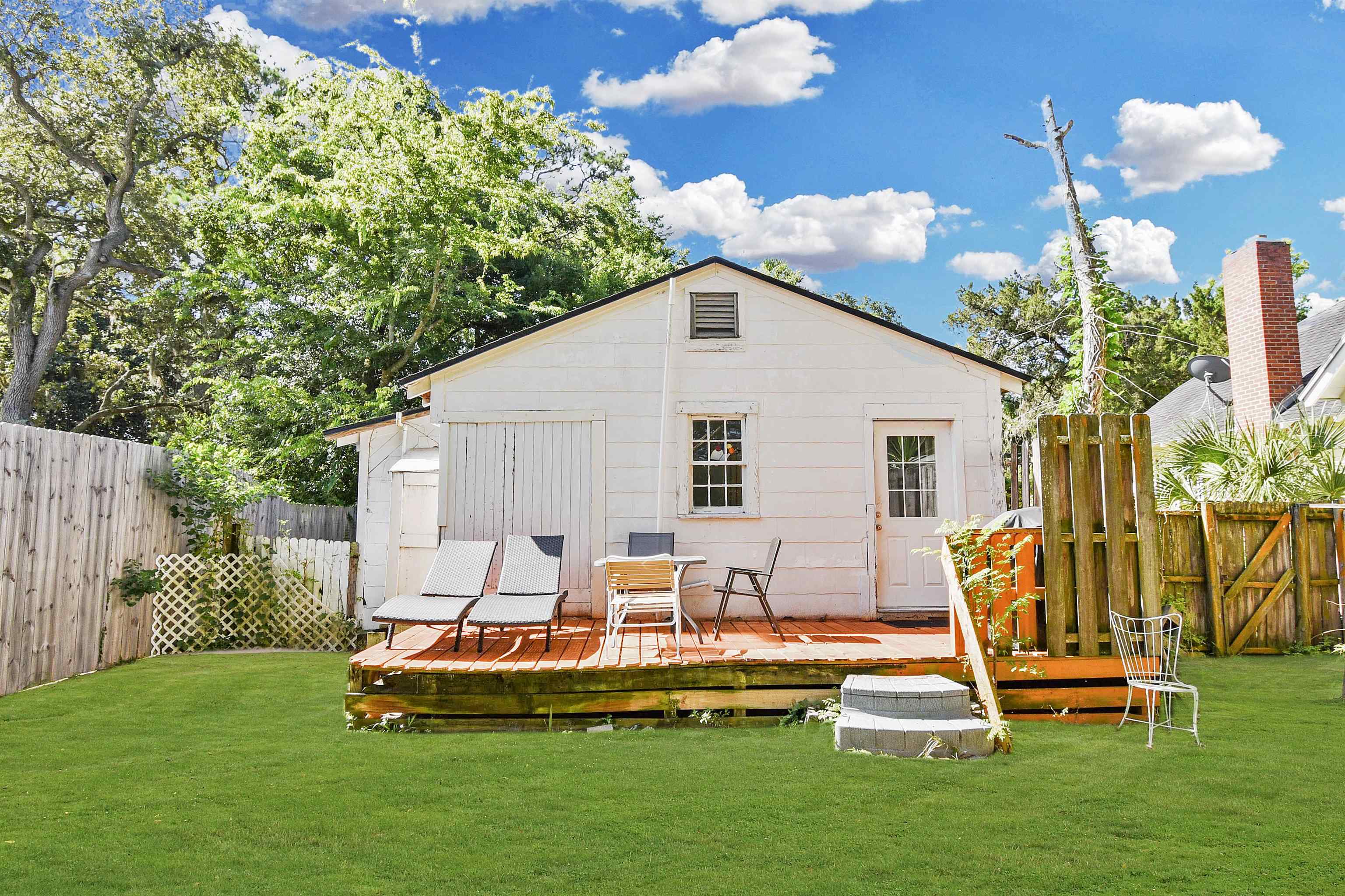 14 Rio Vista Avenue St. Augustine, FL 32084 - Photo 21 of 33 a view of a house with a backyard patio and sitting area