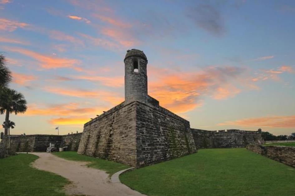14 Rio Vista Avenue St. Augustine, FL 32084 - Photo 24 of 33 a view of a large building with a big yard