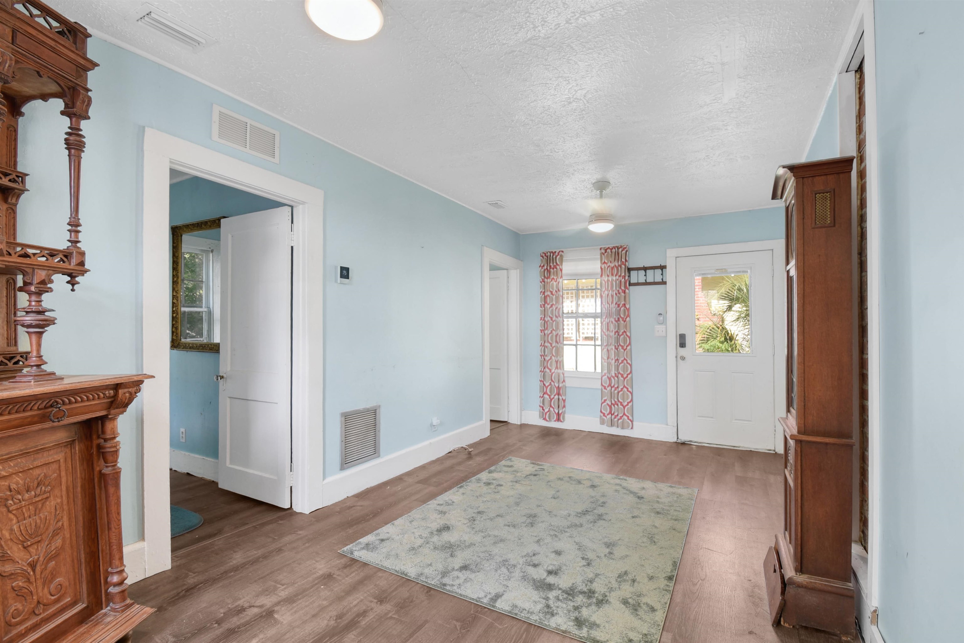 14 Rio Vista Avenue St. Augustine, FL 32084 - Photo 4 of 33 a view of livingroom with hardwood floor and hallway