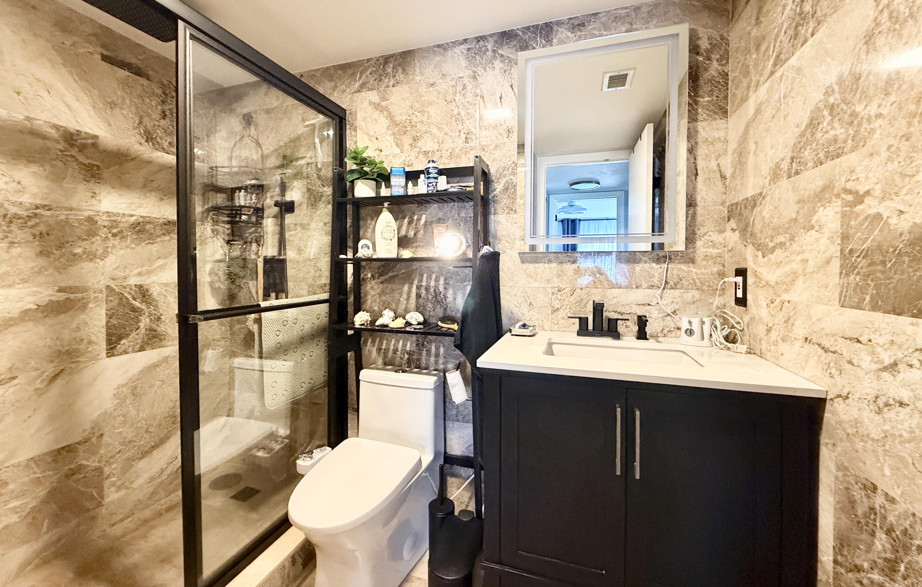 301 Pine Ridge Circle, Unit C2 Greenacres, FL 33463 - Photo 12 of 28 Bathroom