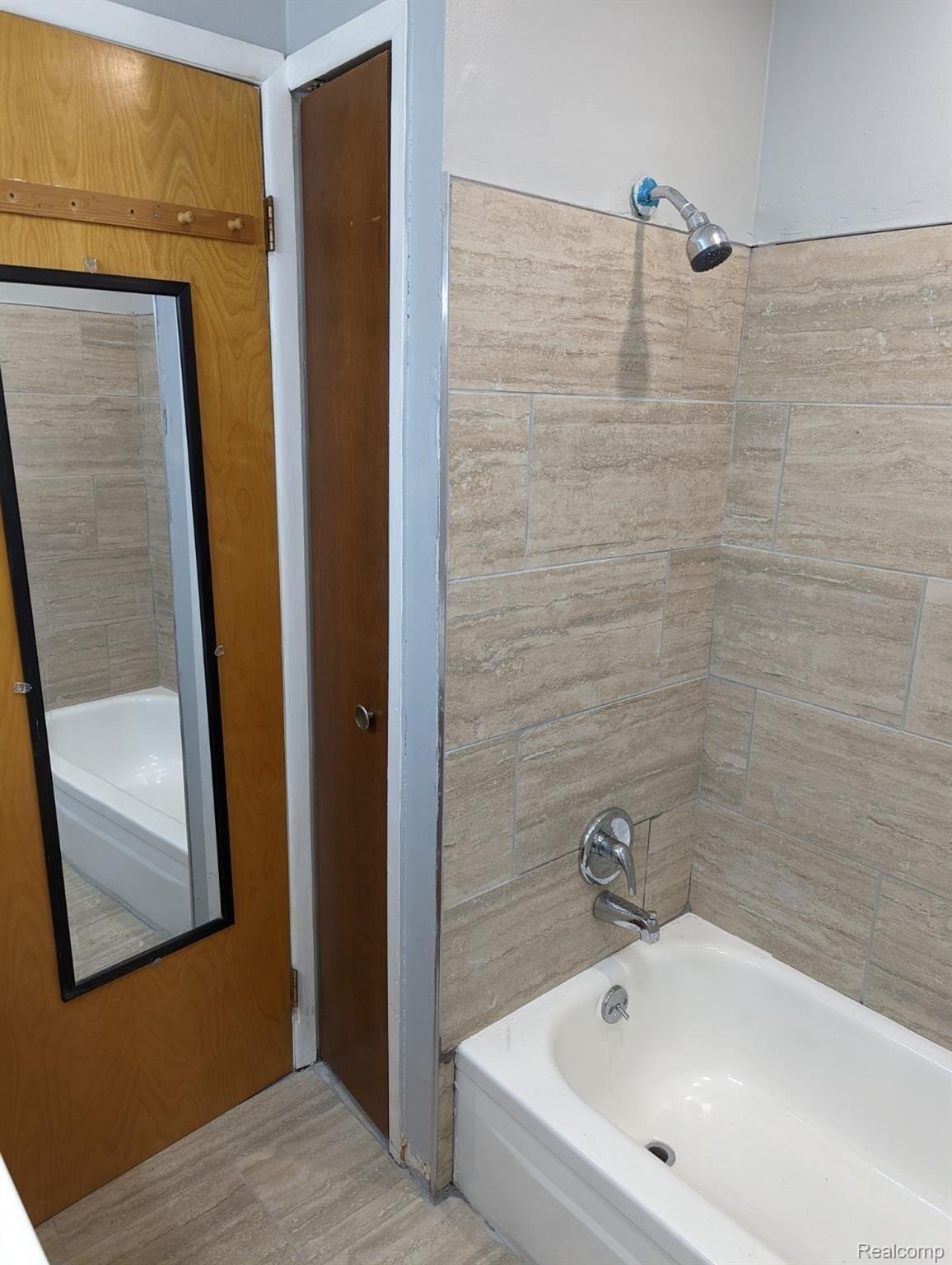 29201 Hayes Road, Unit 5 Warren, MI 48088 - Photo 15 of 20 Mirror behind Bathroom Door