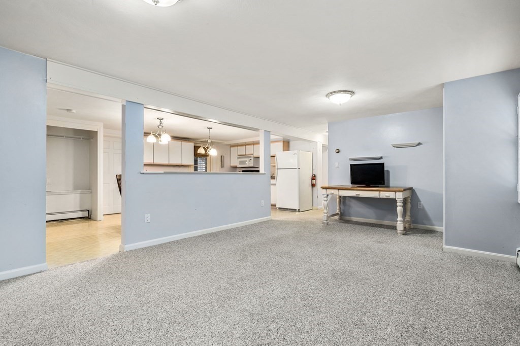 83 Pine Street Natick, MA 01760 - Photo 17 of 28 a view of a kitchen and a kitchen with a sink