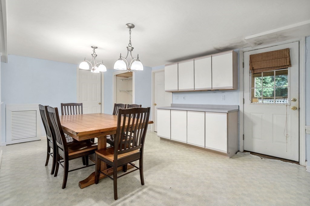 83 Pine Street Natick, MA 01760 - Photo 19 of 28 a view of a dining room with furniture and window