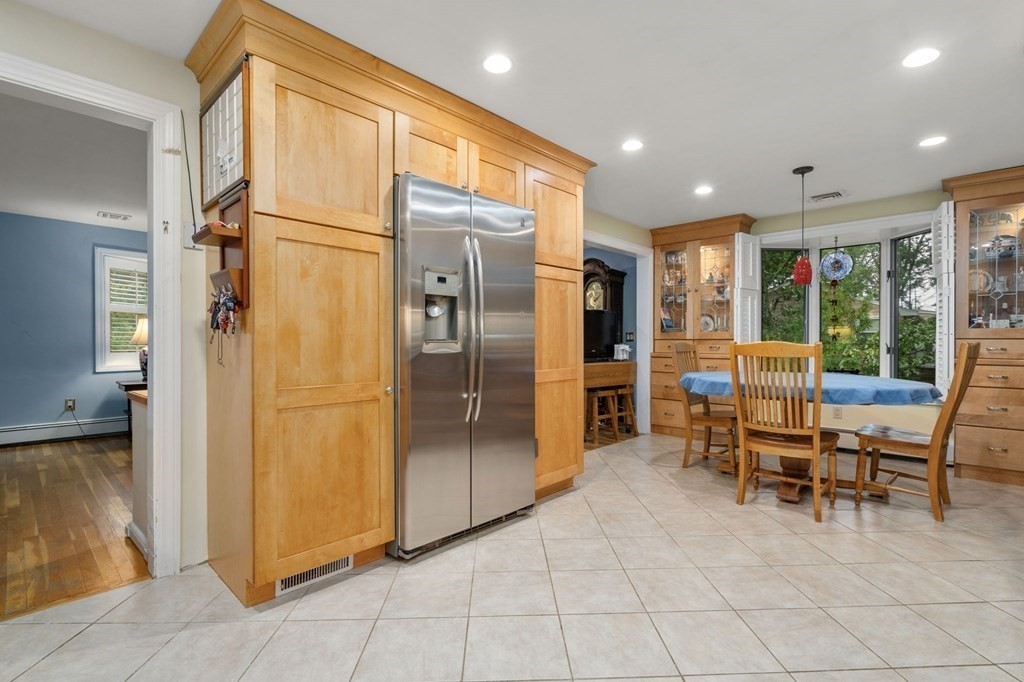83 Pine Street Natick, MA 01760 - Photo 6 of 28 a dining room with furniture