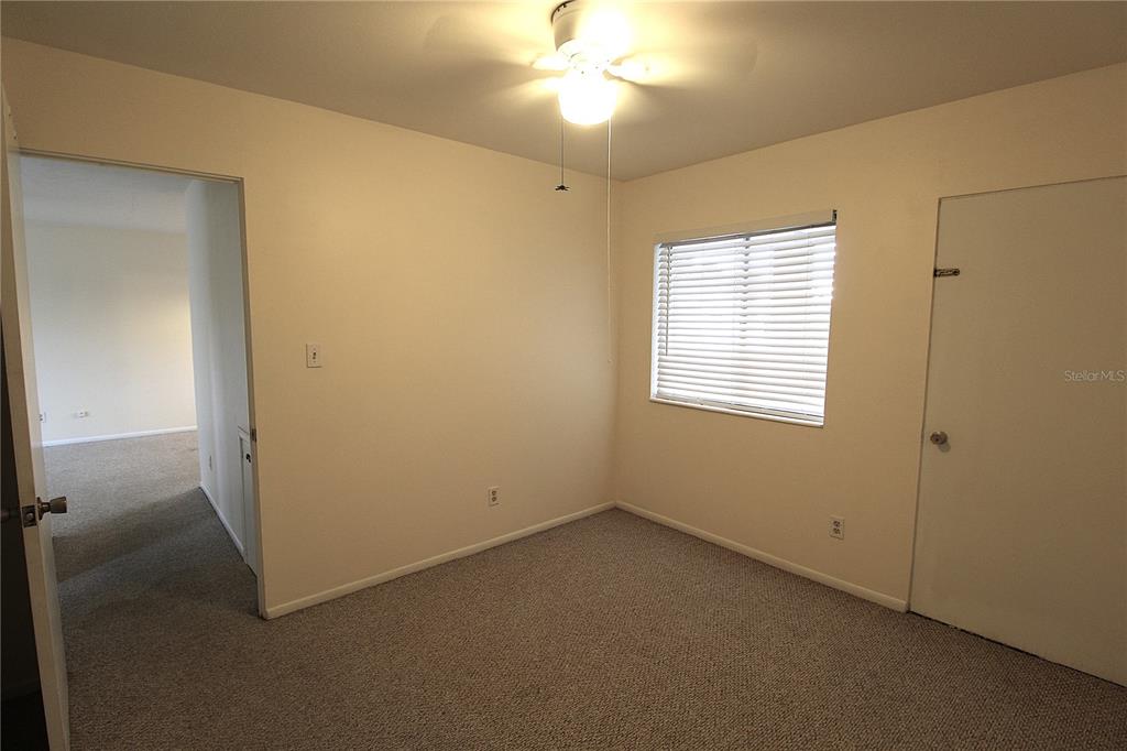 3101 Bee Ridge Road, Unit 209 Sarasota, FL 34239 - Photo 13 of 17 a view of a livingroom with a window