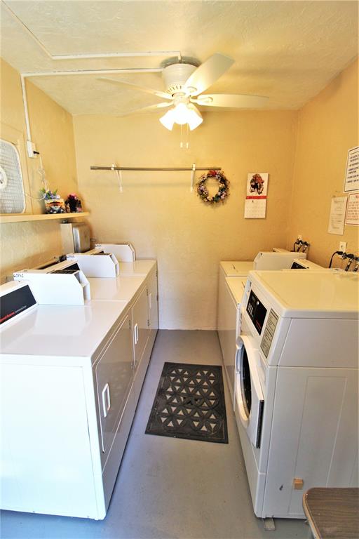 3101 Bee Ridge Road, Unit 209 Sarasota, FL 34239 - Photo 3 of 17 a utility room with dryer and washer