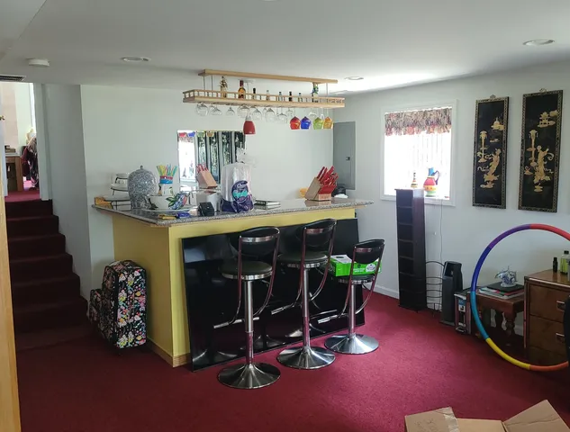 a view of a room with furniture and toys