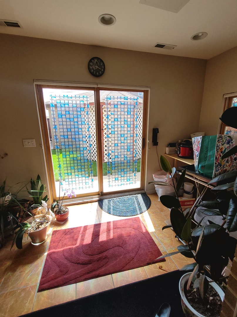 5153 Dobson Street Skokie, IL 60077 - Photo 13 of 27 a room with furniture and a large window